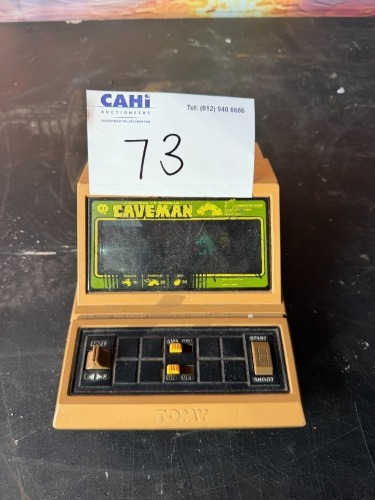 CAVEMAN TOMY GAME
