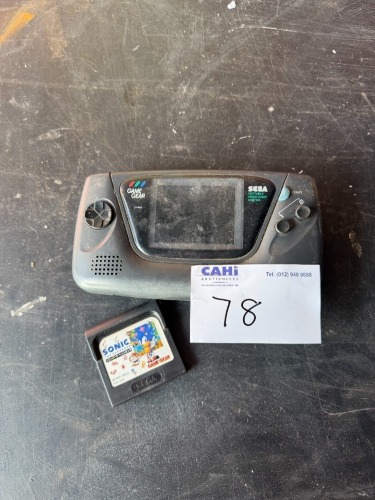 SEGA PORTABLE VIDEOGAME AND GAME