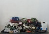 ASSORTED CABLES, LIGHT BULBS, DART BOARD, HAND SAW, CIRCUIT BREAKERS, ANGLE GRINDER AND OTHER GOODS - 2